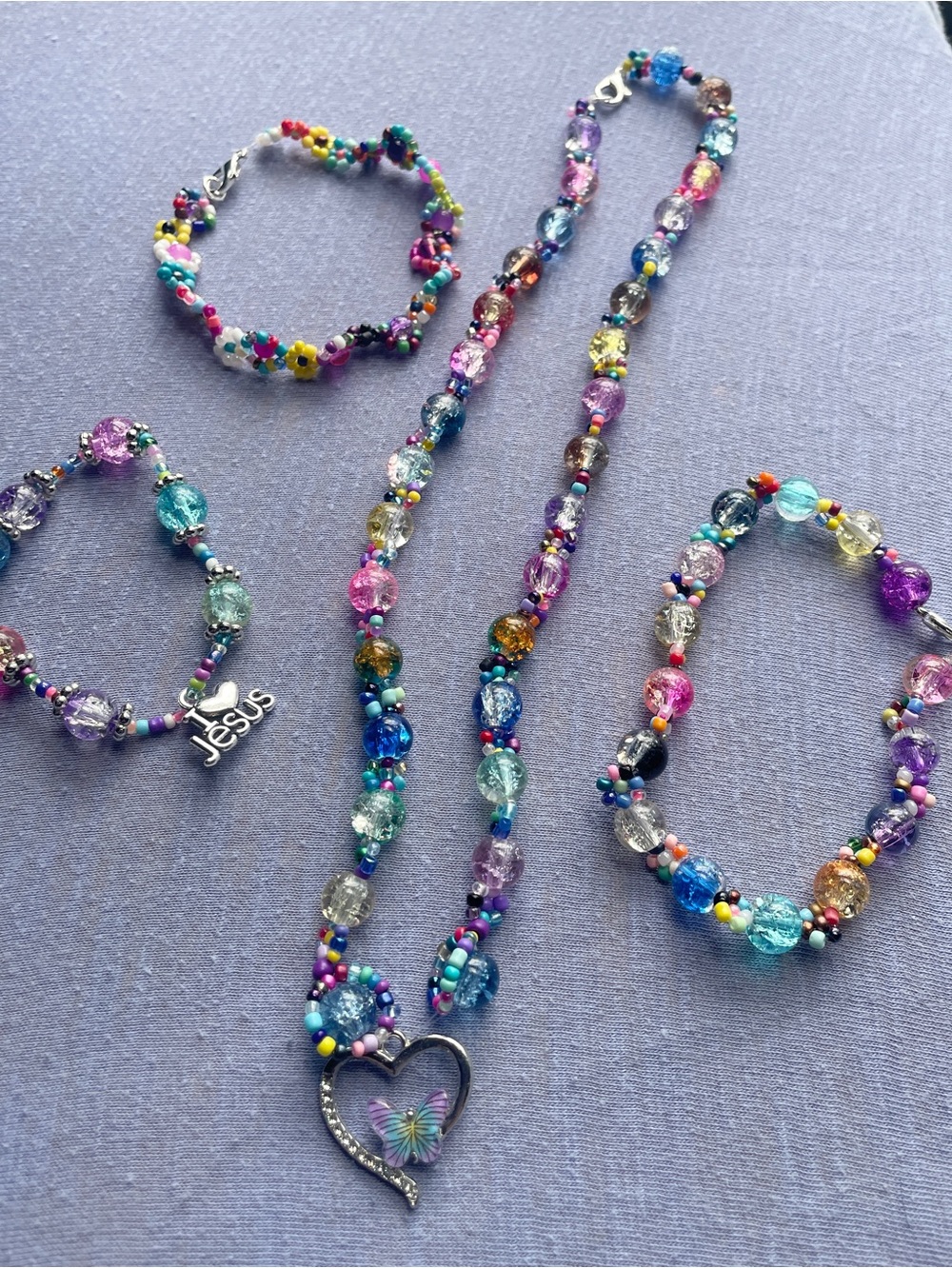 Set Of Four Multicolor Beaded Heart Pendant Butterfly Necklace and Bracelet Set